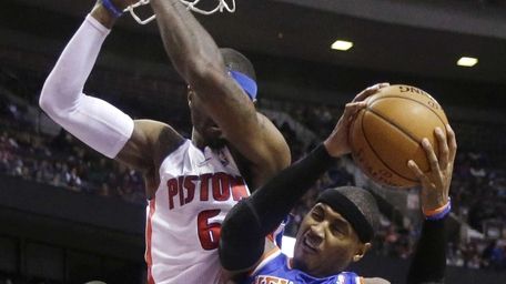 Knicks forward Carmelo Anthony is blocked by Detroit