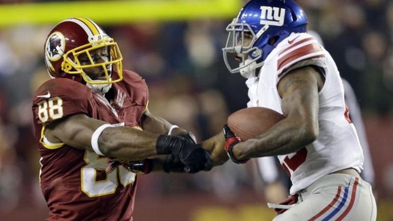 Giants free safety Will Hill, right, takes the