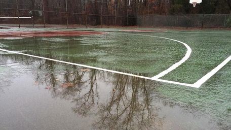 The basketball and tennis courts at Laurel Drive