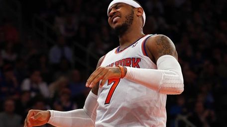Carmelo Anthony reacts after a play against the