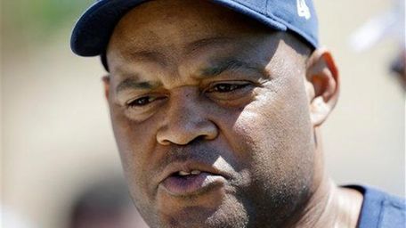 Seahawks assistant coach Ken Norton talks to the