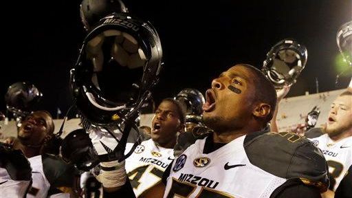 Missouri's Michael Sam (52) sings the school song