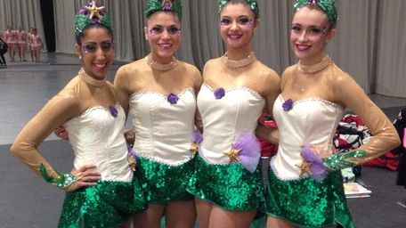 Commack High School's Cougarettes kickline team won the