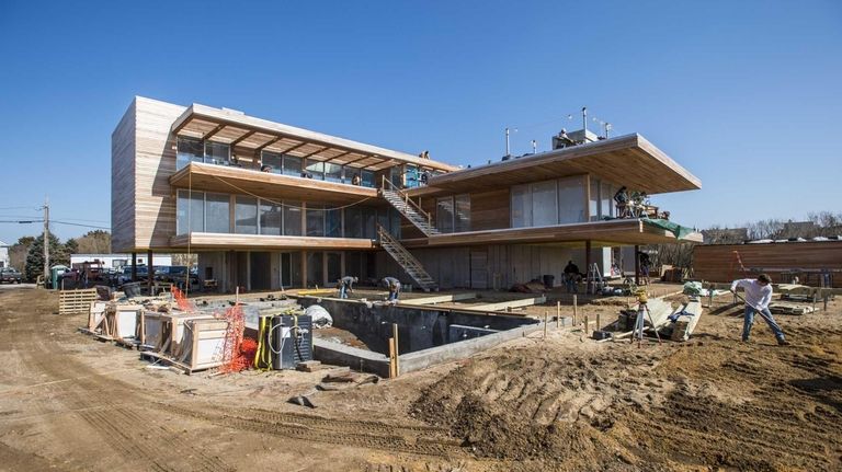 An oceanfront home being built by Fred G.