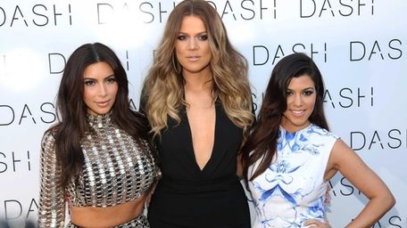 Kim Kardashian, Khloe Kardashian and Kourtney Kardashian attend