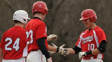 Connetquot RF Marc Wangenstein, right, gets congratulated by