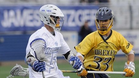 Hofstra attacker Sam Linares is guarded by Drexel