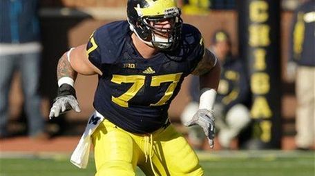 Michigan offensive linesman Taylor Lewan (77) is seen
