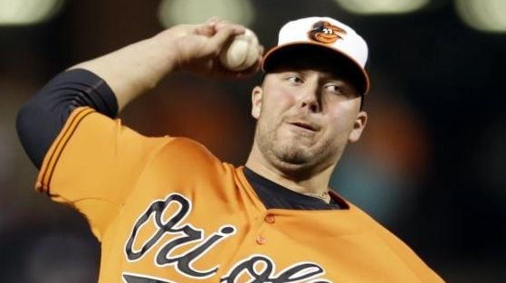 Baltimore Orioles relief pitcher Tommy Hunter throws to