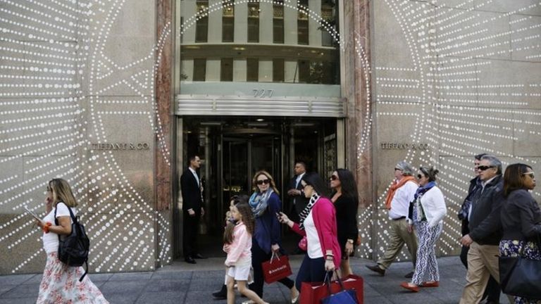 Shoppers walk by Tiffany & Company's Fifth Avenue