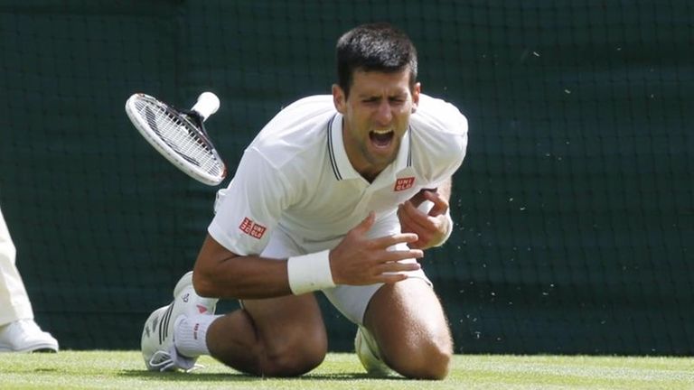 Novak Djokovic of Serbia shouts in pain after