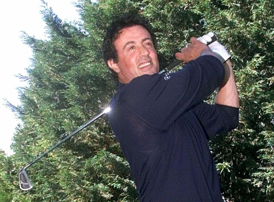 Sylvester Stallone plays golf during the Laureus Celebrity