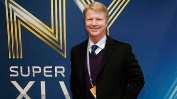 Phil Simms arrives at Super Bowl XLVIII on