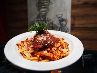Beef braciola, stuffed with pine nuts and raisins,