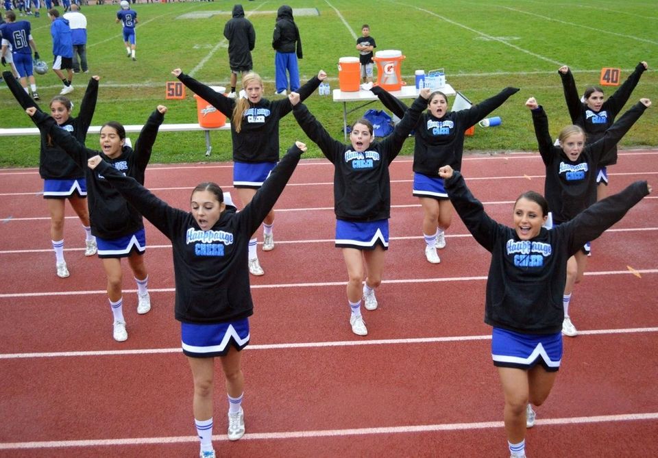 The Hauppauge High School cheerleaders pump up the