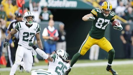 The Green Bay Packers' Jordy Nelson gets away