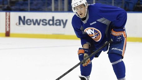 New York Islanders' Ryan Pulock skates during Group