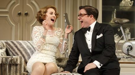 Megan Mullally and Nathan Lane in a scene