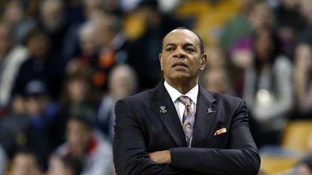 Nets coach Lionel Hollins watches from the sidelines