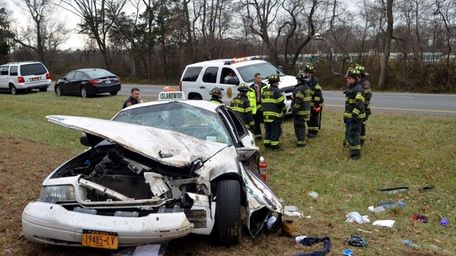 Rescuers at scene of a one-car crash Sunday,
