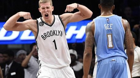 Brooklyn Nets center Mason Plumlee reacts after he