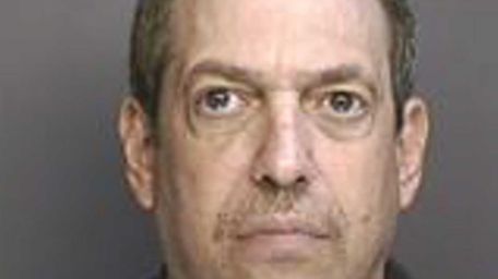 Neal Shudak, 58, of Holbrook, was arrested Thursday,