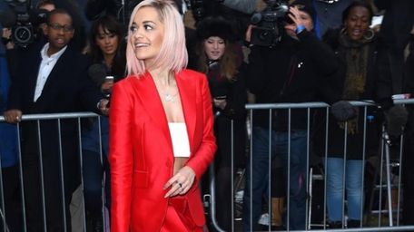 Singer Rita Ora leaves a music studio after