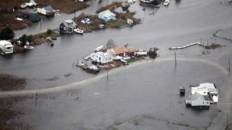 Flooding from superstorm Sandy damaged many homes on