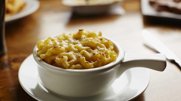 Macaroni and cheese, presented in a small casserole